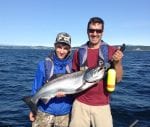 Boy and father fishing at Pacific Playgrounds