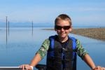 Boy enjoying a day on the water